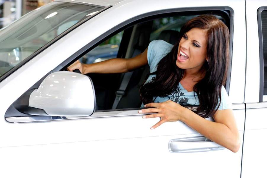 What causes road rage? An angry driver in a white vehicle