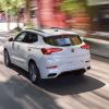 A rear exterior shot of a 2023 Buick Encore GX subcompact SUV model in White Frost Tricoat