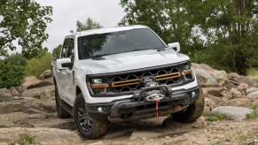 The 2024 Ford F-150 Tremor off-roading in dirt