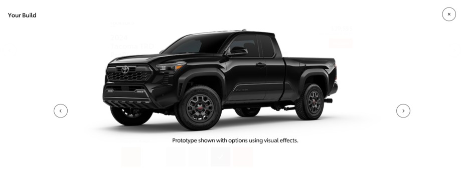 Black Toyota Tacoma Prerunner special edition midsize pickup truck.