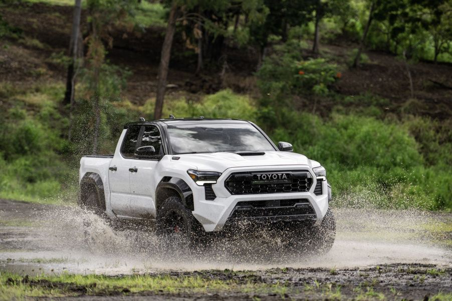 The 2024 Toyota Tacoma TRD Pro splashing through mud