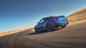 A 2024 Subaru BRZ tS takes a corner on a desert track.