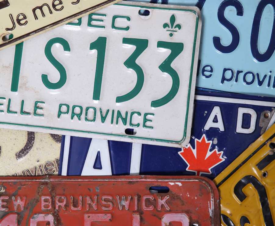 License plates from multiple provinces in Canada.