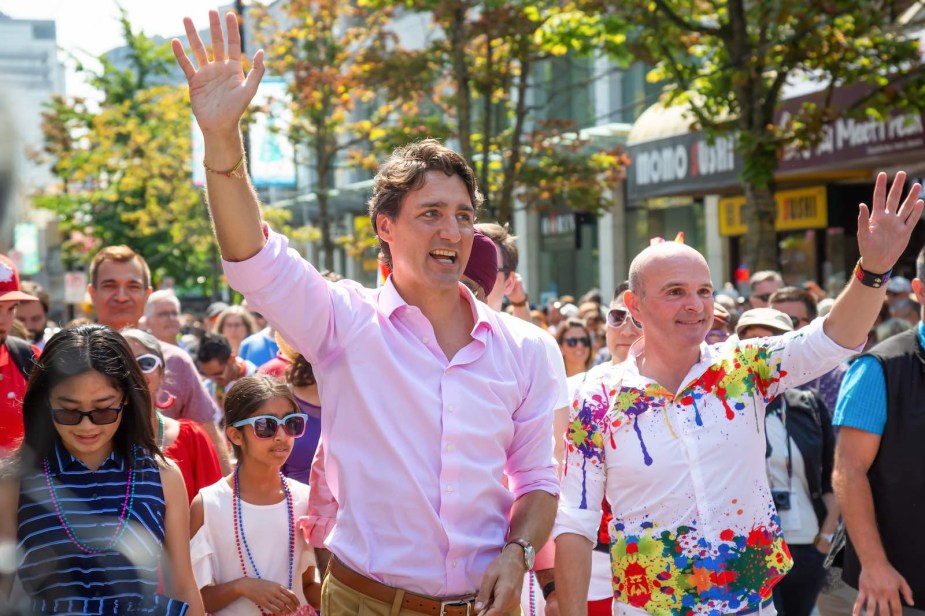 Canada's Prime Minister, Justin Trudeau waves during a parade in Vancouver