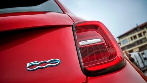 A 2024 FIAT 500e shows off its rear lights and badge.