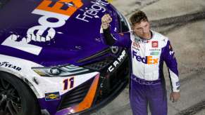 Denny Hamlin celebrates after winning at Bristol