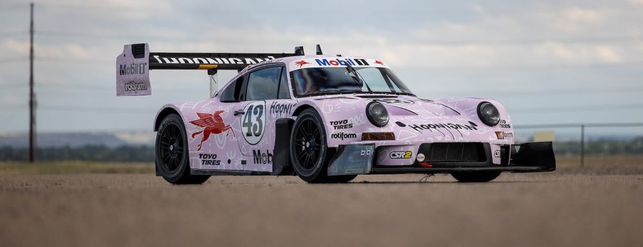 Custom pink Porsche 911 with a 14,000 horsepower engine driven up the Pike's Peak hill climb by Lia Block, daughter of Ken.