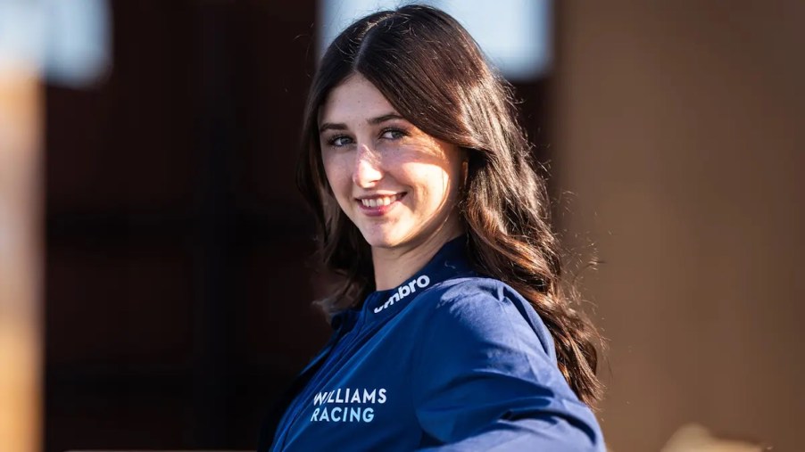 Ken Block's daughter, Lia, smiling for a portrait.