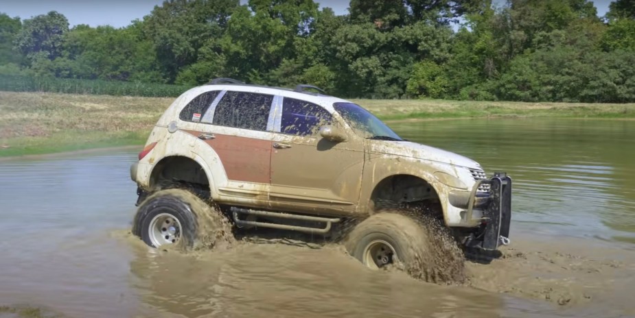 White PT Cruiser in a pond