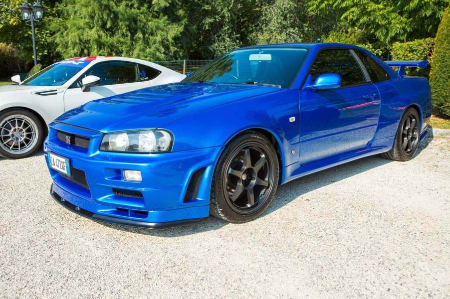 A blue R34 Nissan Skyline GT-R meets Dick Merritt's 25-year rule for import cars.