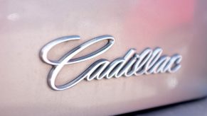 A Cadillac badge like the one on Dolly Parton's 1997 Cadillac d"Elegance.