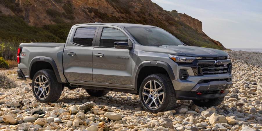 The 2024 Chevy Colorado off-roading over rocky terrain