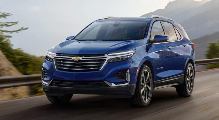 The 2023 Chevy Equinox driving on the road