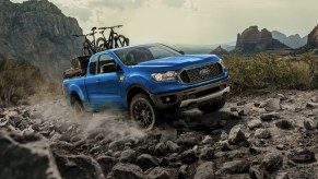 The 2023 Ford Ranger off-roading over rocky terrain