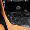 A 2023 Toyota GR Supra shows off its manual gear selector.
