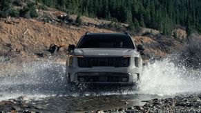 The 2024 Kia Sorento X-Pro off-roading through water