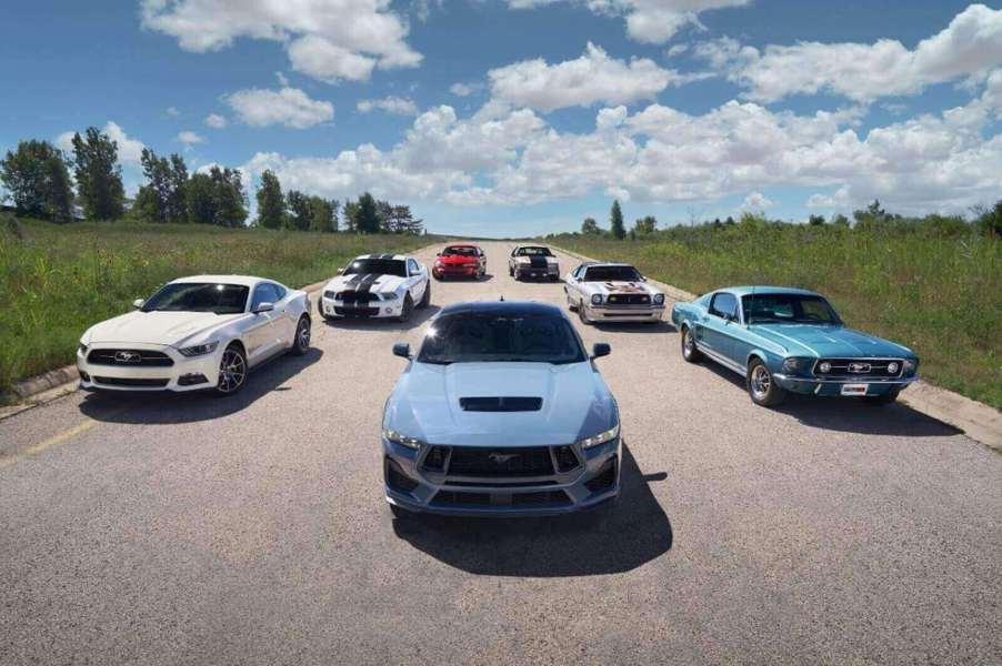 A lineup of the Ford Mustang GT generations throughout the years.