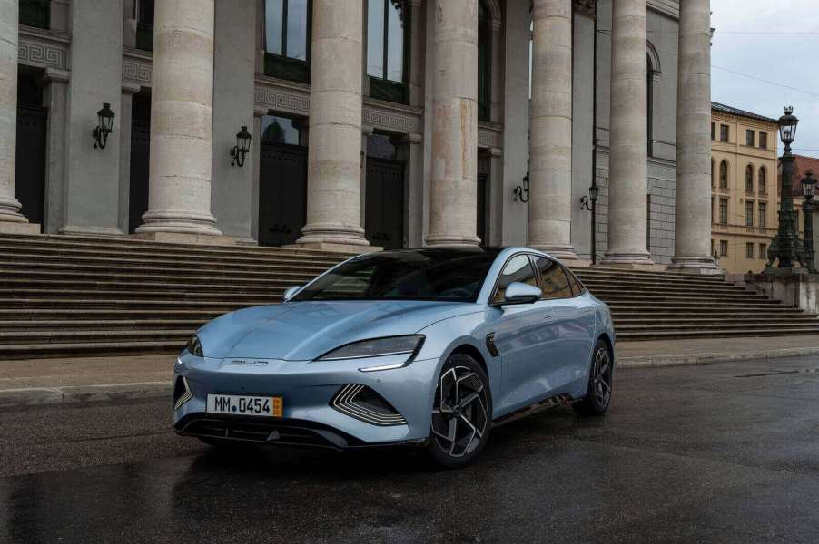 A silver blue BYD Seal, a natural competitor for the Tesla Model 3, shows off its front-end styling in Hungary.