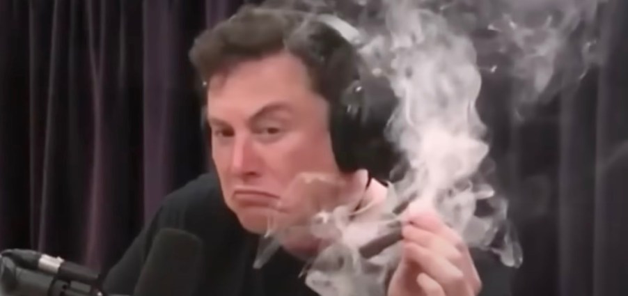 Tesla CEO Elon Musk smokes weed during a Joe Rogan podcast.