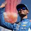 Kyle Larson, driver of the #5 HendrickCars.com Chevrolet, waves to fans onstage during driver intros prior to the NASCAR Cup Series Championship at Phoenix Raceway on November 05, 2023 in Avondale, Arizona.