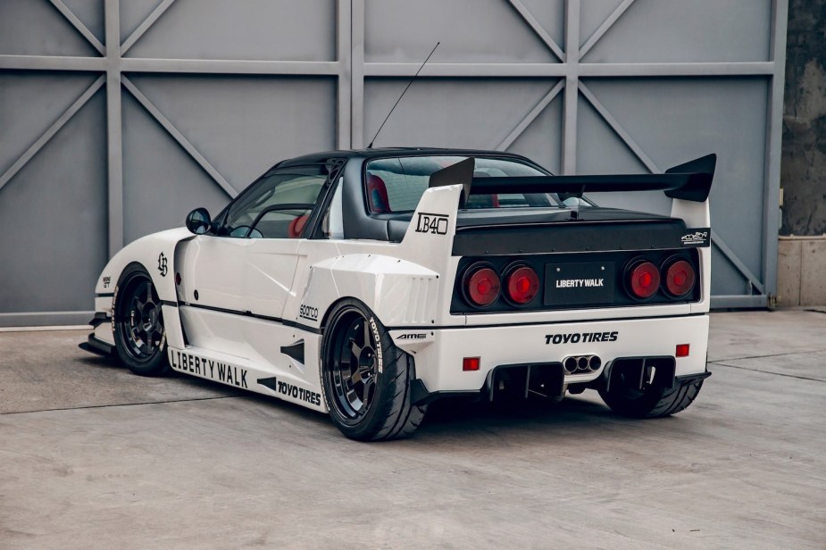 Rear view of a mid-engine Mazda sports car