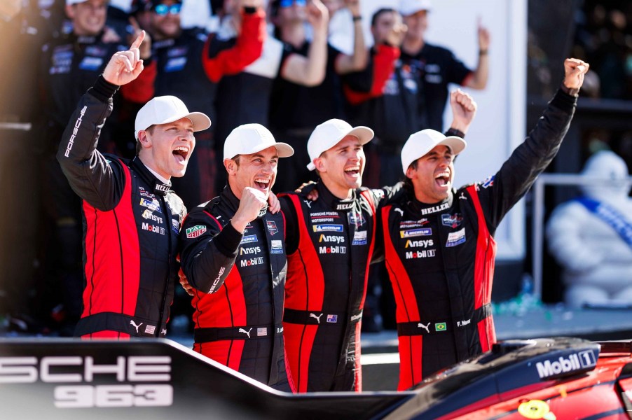 Dane Cameron, Felipe Nasr, Matt Campbell and Josef Newgarden of the No. 7 Penske Porsche celebrate In victory lane after winning overall in the Rolex 24 at Daytona