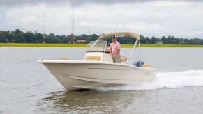 A 19.5-foot Scout Boats Sportfisher cruises the waters.