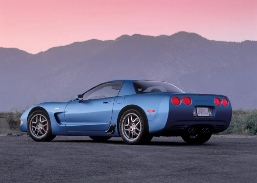 A blue Chevrolet Corvette Z06 sports car shows off its rear-end styling.