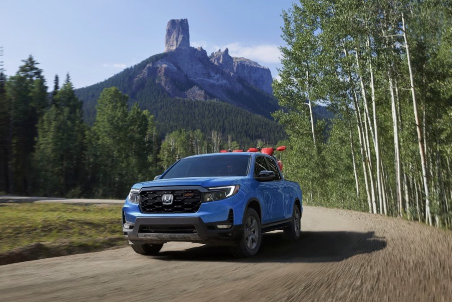 The 2024 Honda Ridgeline TrailSport on a dirt road