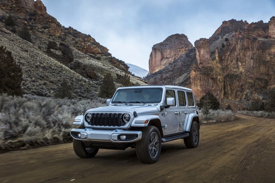 The 2024 Jeep Wrangler on a dirt road