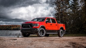 The 2024 Ram 1500 parked by a lake