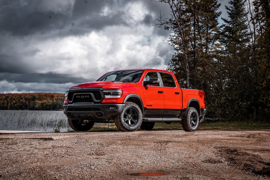 The 2024 Ram 1500 parked by a lake