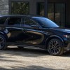 The 2025 Mazda CX-70 parked near a house