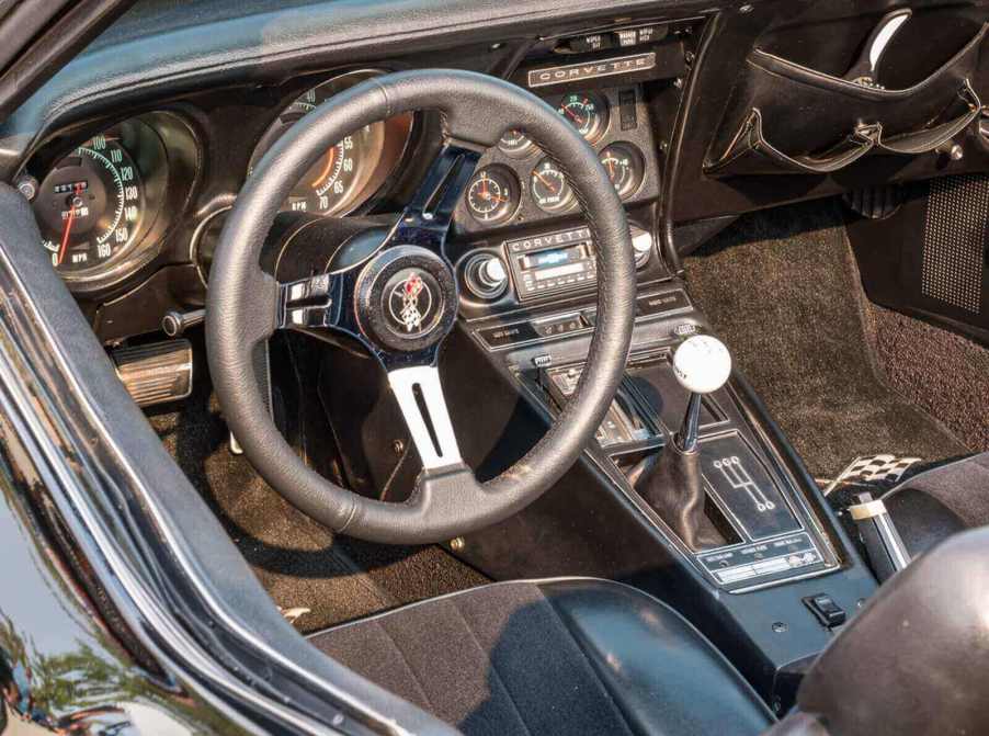 A C3 Corvette shows off its manual transmission.