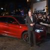 Jeremy Clarkson at an event with an Alfa Romeo Stelvio Quadrifoglio.