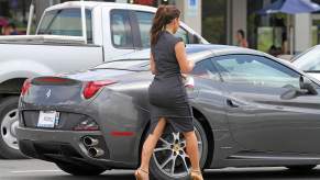 Billionaire Kim Kardashian gets into a Ferrari Coupe