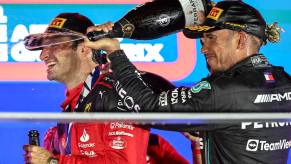 Lewis Hamilton and Carlos Sainz Jr. of Scuderia Ferrari in Singapore