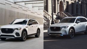 White and silver Mazda crossover SUVs next to each other.