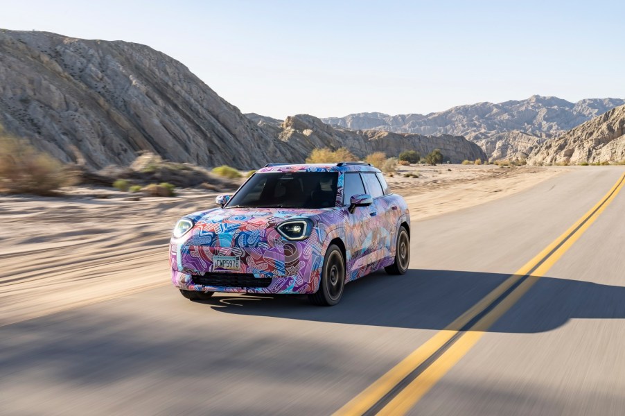 A pre-production Mini Aceman driving along a road