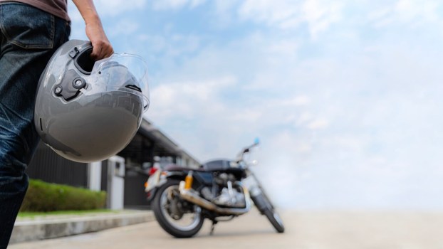 What Does the Head Tap Motorcycle Hand Signal Mean?