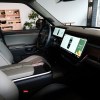 White leather interior of a Rivian electric pickup truck.