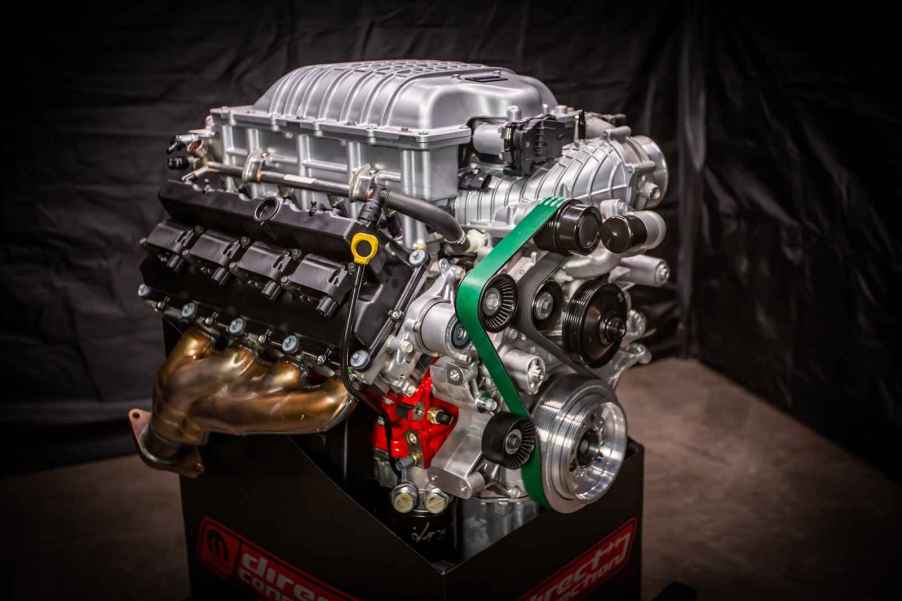 Mopar's Hellephant V8 Hemi crate engine on display with shadowy lighting