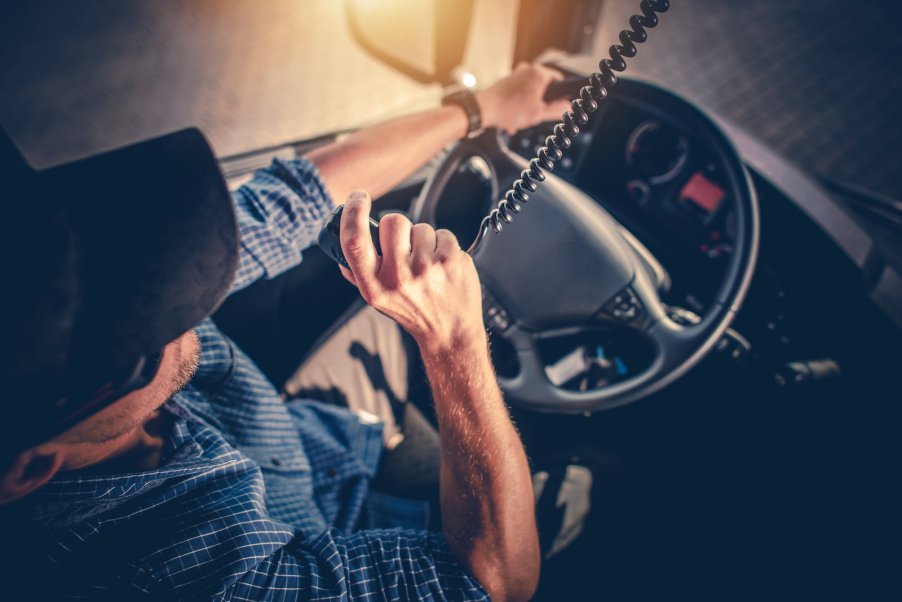 A truck driver talking on his CB radio