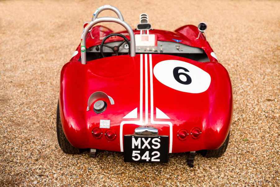 Rear of a red vintage roadster race car.