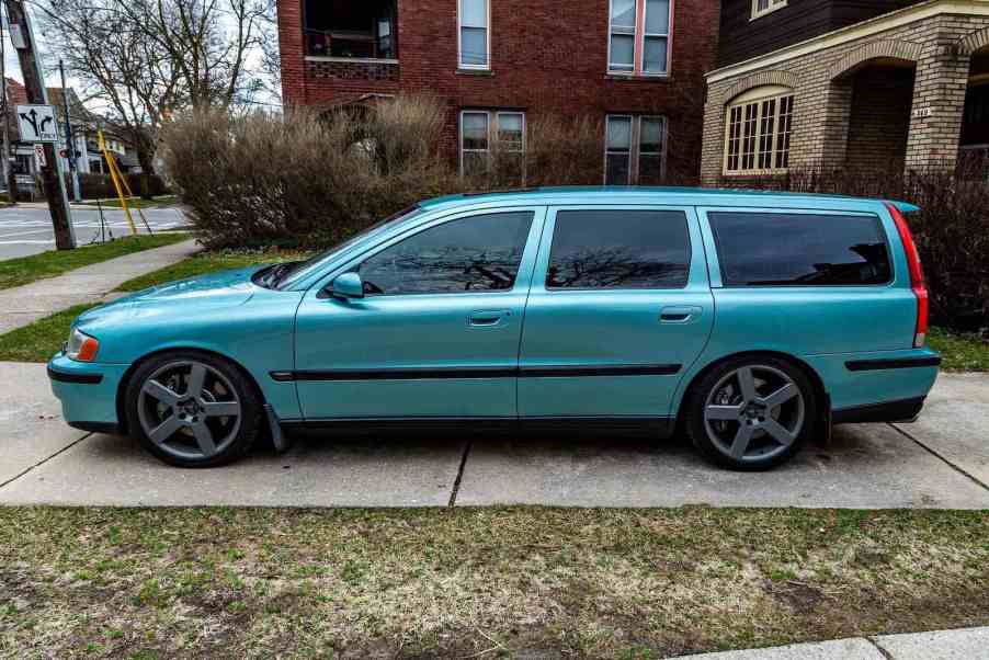 Unique green stick shift Volvo V70 R turbocharged wagon in a driveway