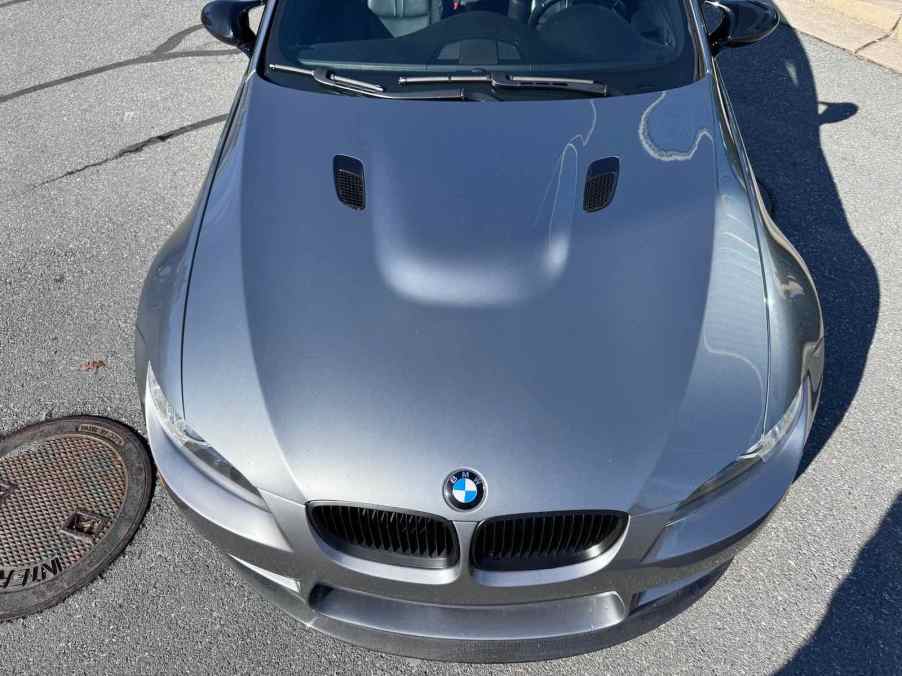 Hood. bulge on a gray V8-powered BMW M3 coupe from 2008.