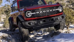 The 2024 Ford Bronco crawling over rocks