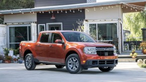 The 2024 Ford Maverick parked near a home