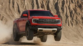 The 2024 Ford Ranger Raptor jumping in the desert