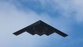 A B-2 Stealth Bomber, like the one captured on Google Earth, cruises overhead.